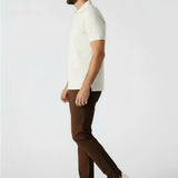 Side profile fit of dark brown chino pants for men