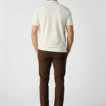 Back view of dark brown slim fit pants showing pocket details