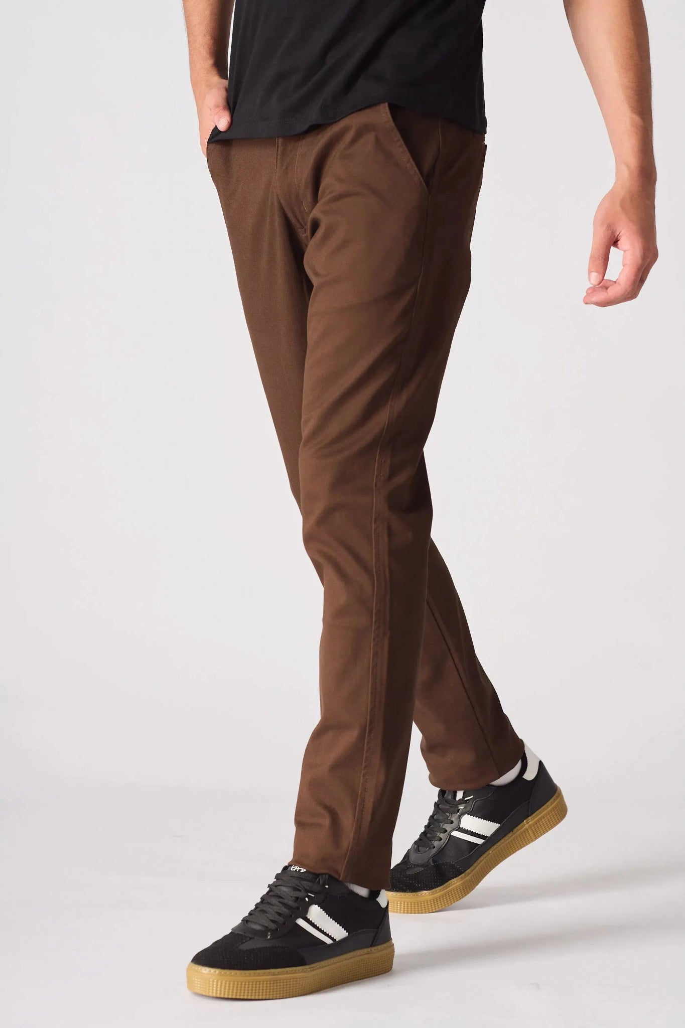 Close up of the tailored leg on dark brown slim fit chinos.
