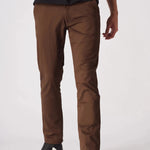 Detailed front view from the waist of dark brown slim fit chinos.