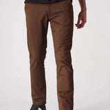 Detailed front view from the waist of dark brown slim fit chinos.