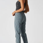 Back and side angle of distressed black corset top showing zipper closure - women's strapless denim bustier with cargo jeans