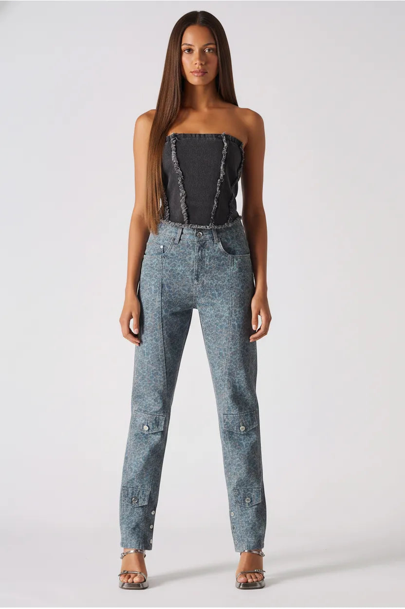 Front view of black wash distressed corset top with raw hem detail - women's strapless textured denim bustier with cargo pants