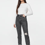 Front view of a model wearing Distressed Straight Leg Jeans in Dark Grey Wash paired with white sneakers