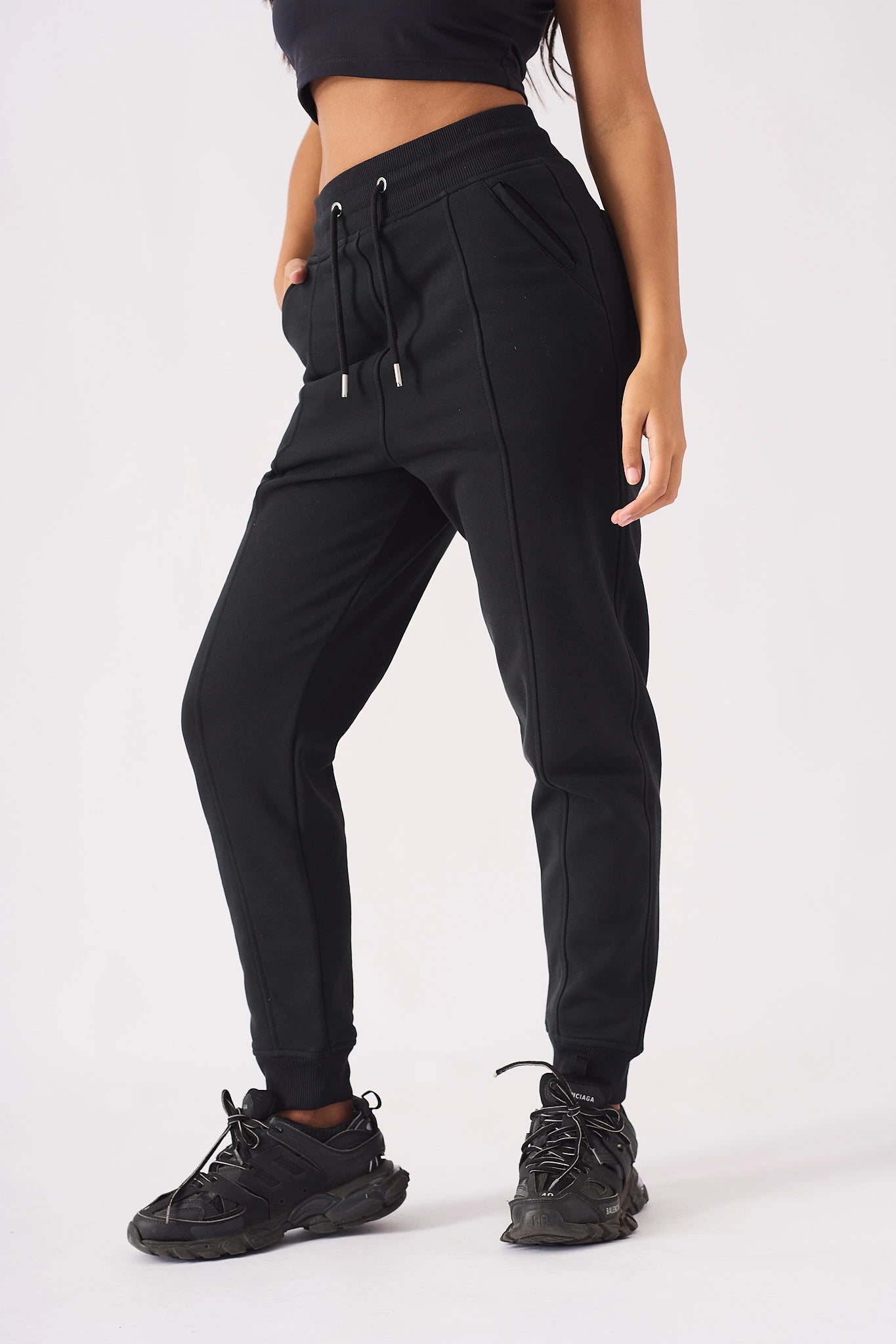 Black essential pintuck relaxed jogger with drawstring waist showing front fit