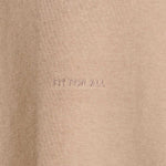 Close-up of the 'Fit For All' tonal embroidery detail