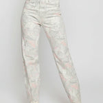 Floral-patterned jeans worn by a person on a white background