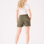 Rear view of green jogger shorts for women showing the tonal logo on the pocket