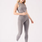 Mid shot view of a comfortable grey racer neck crop top for women