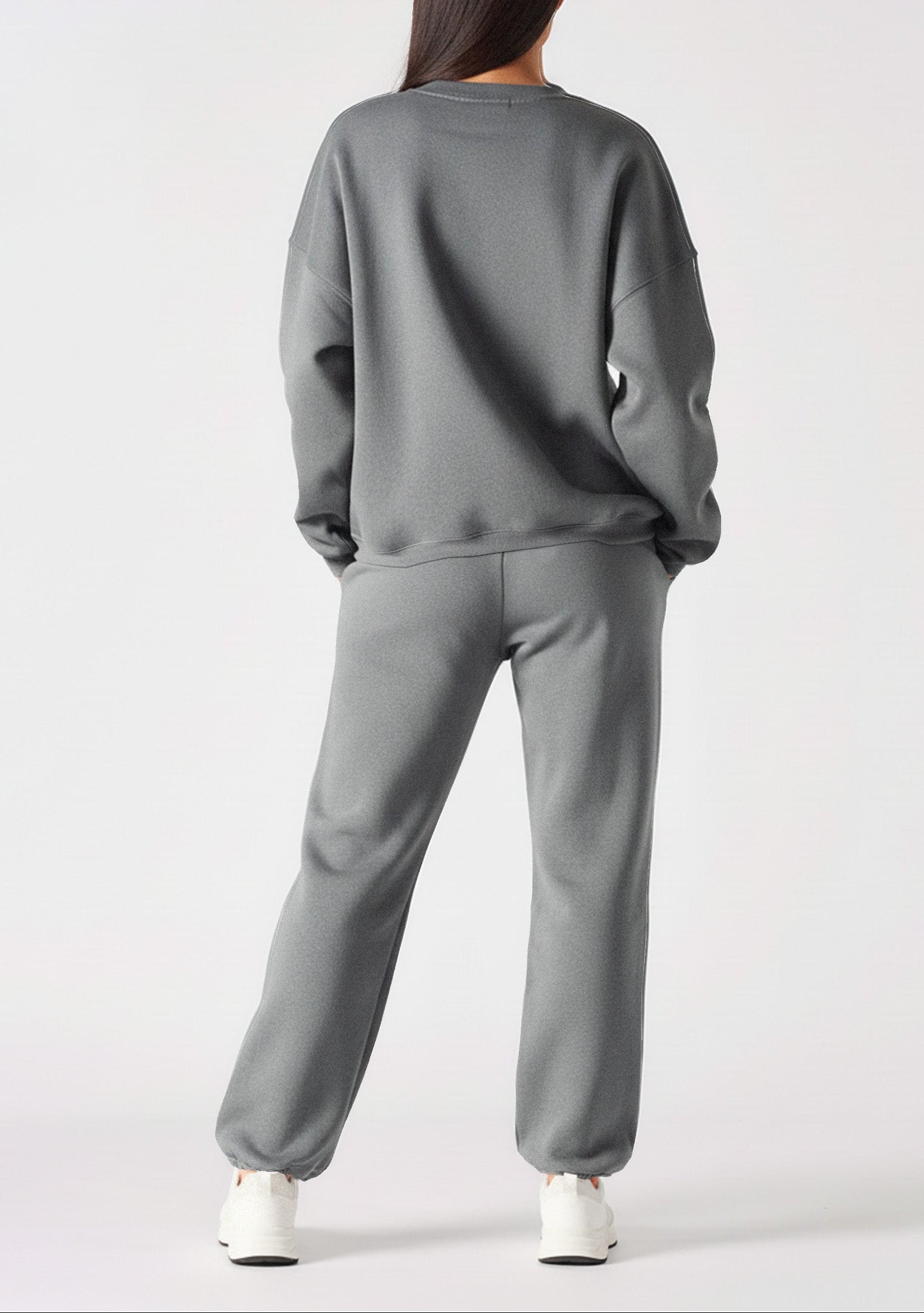 Rear view showing the comfortable fit of the grey cuffed joggers womens.