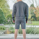 back view wearing grey oversized crew neck jumper