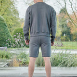 back view wearing grey oversized crew neck jumper