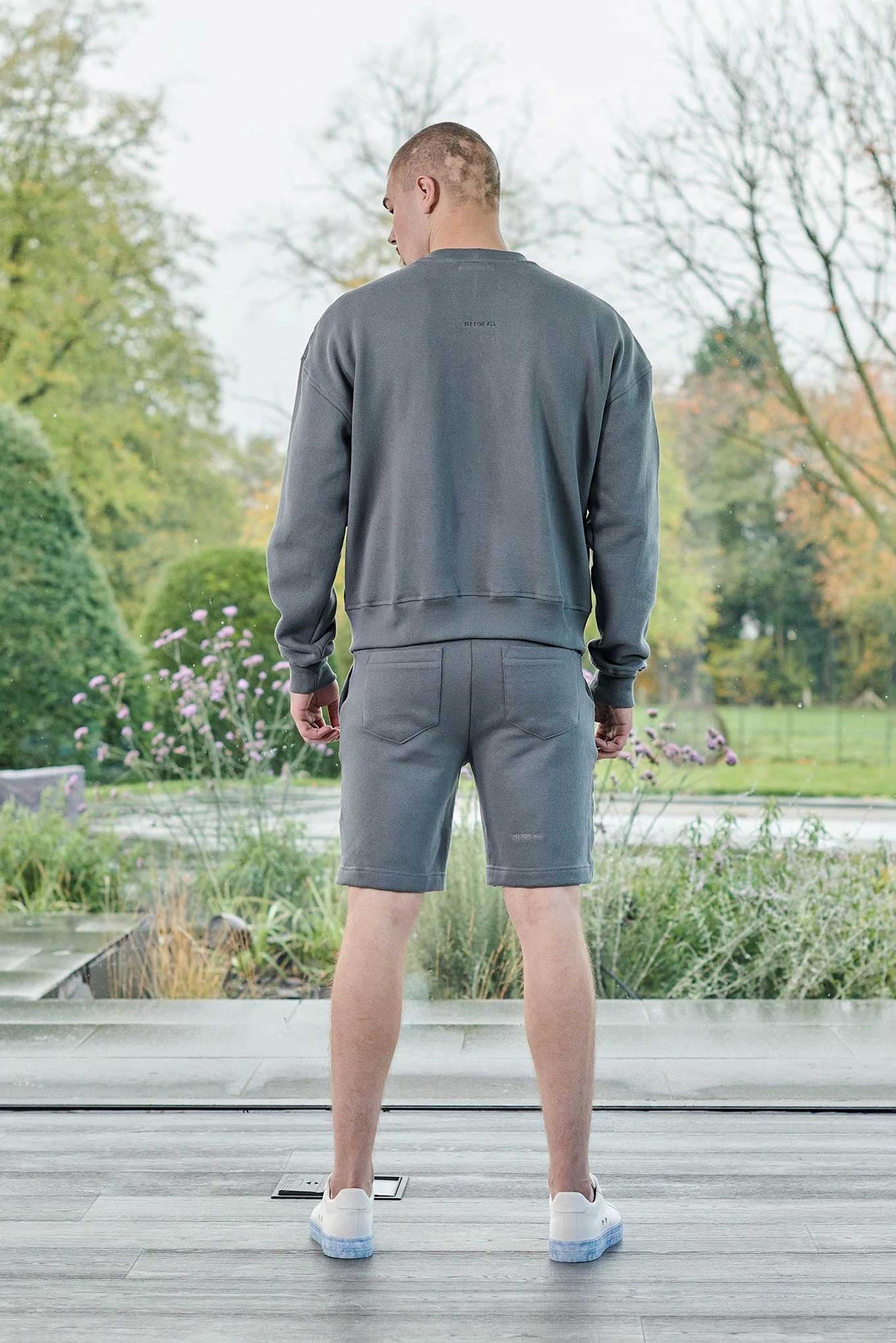 back view wearing grey oversized crew neck jumper
