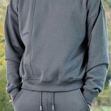 front view wearing grey oversized crew neck jumper