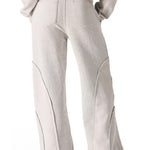 Back view showing the clean wide leg fit of the grey seam detail wide leg joggers women.