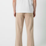 Back view of the Herman men's beige wide-leg joggers showing the patch pockets.