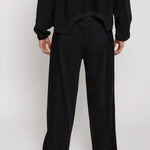 Back view of the Herman men's black wide-leg joggers showcasing the full silhouette.