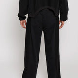 Back view of the Herman men's black wide-leg joggers showcasing the full silhouette.