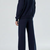 Back view of the Herman men's navy tracksuit, showing the oversized fit of the hoodie.