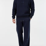 Model wearing the full Herman men's navy loungewear set.