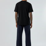 Back view of the Herman men's navy wide-leg joggers showing the relaxed silhouette.