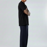 Full side profile of the Herman men's navy wide-leg joggers.