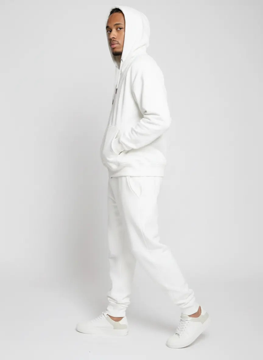 Angled side profile of the Herman men's white zip hoodie, highlighting the hood and fit