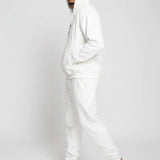 Angled side profile of the Herman men's white zip hoodie, highlighting the hood and fit