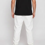 Back view of the Herman men's white tapered joggers showcasing the clean design and fit