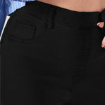 Close up of the waistband on the high rise black jeggings for women showing the fabric texture.