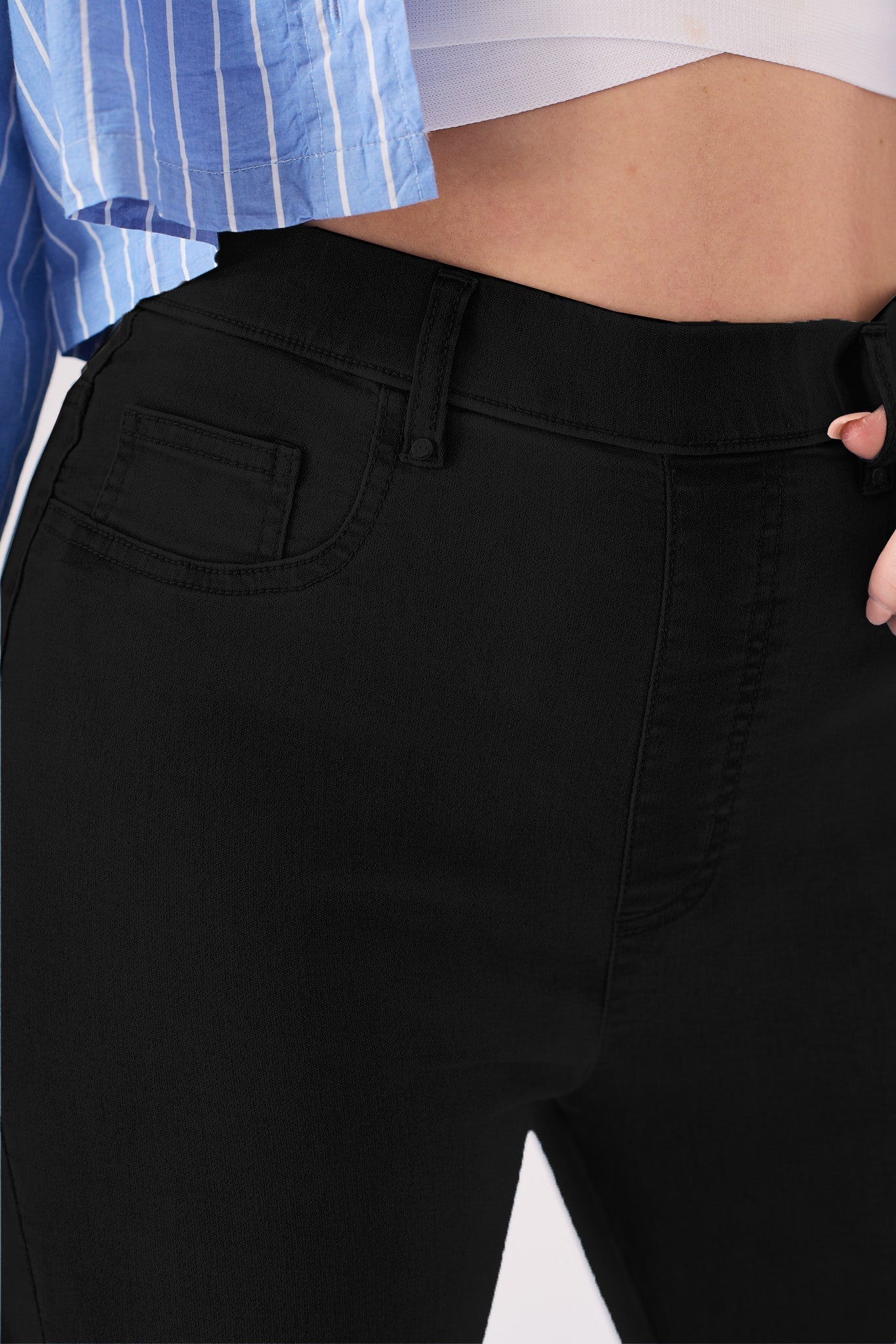 Close up of the waistband on the high rise black jeggings for women showing the fabric texture.
