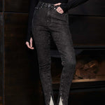 Showcasing the fit of the high-waisted black acid wash skinny jeans
