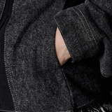 Jmojo black contrast denim jacket slip pocket and frayed hem close up