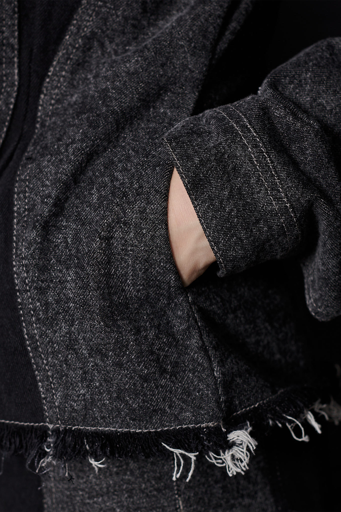 Jmojo black contrast denim jacket slip pocket and frayed hem close up