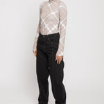 Jmojo black contrast stitch jeans side front view on model