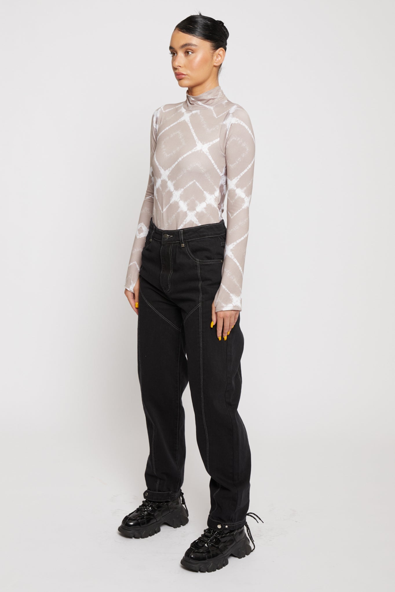 Jmojo black contrast stitch jeans side front view on model