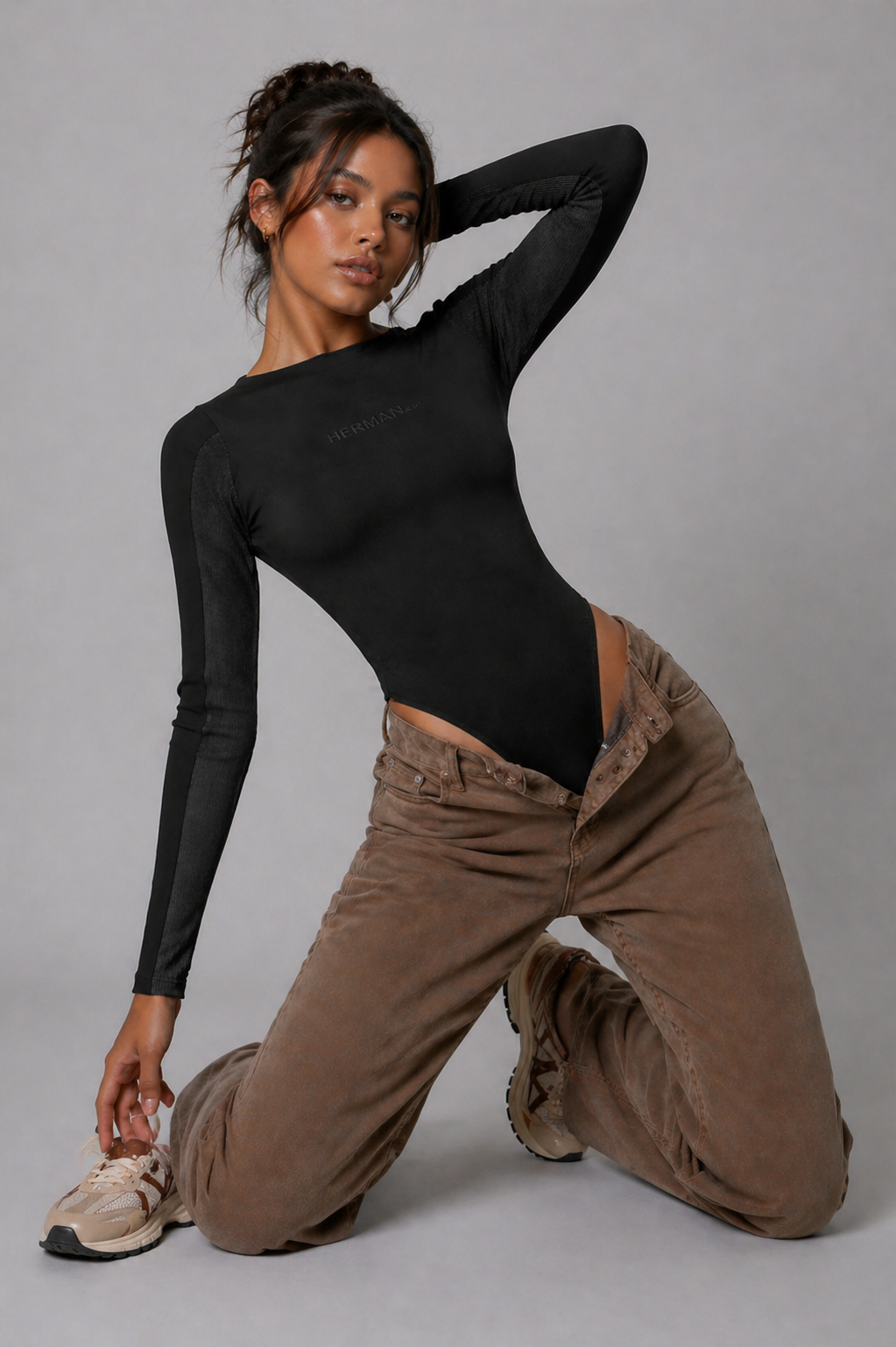 Jmojo black long sleeve ribbed bodysuit kneeling pose