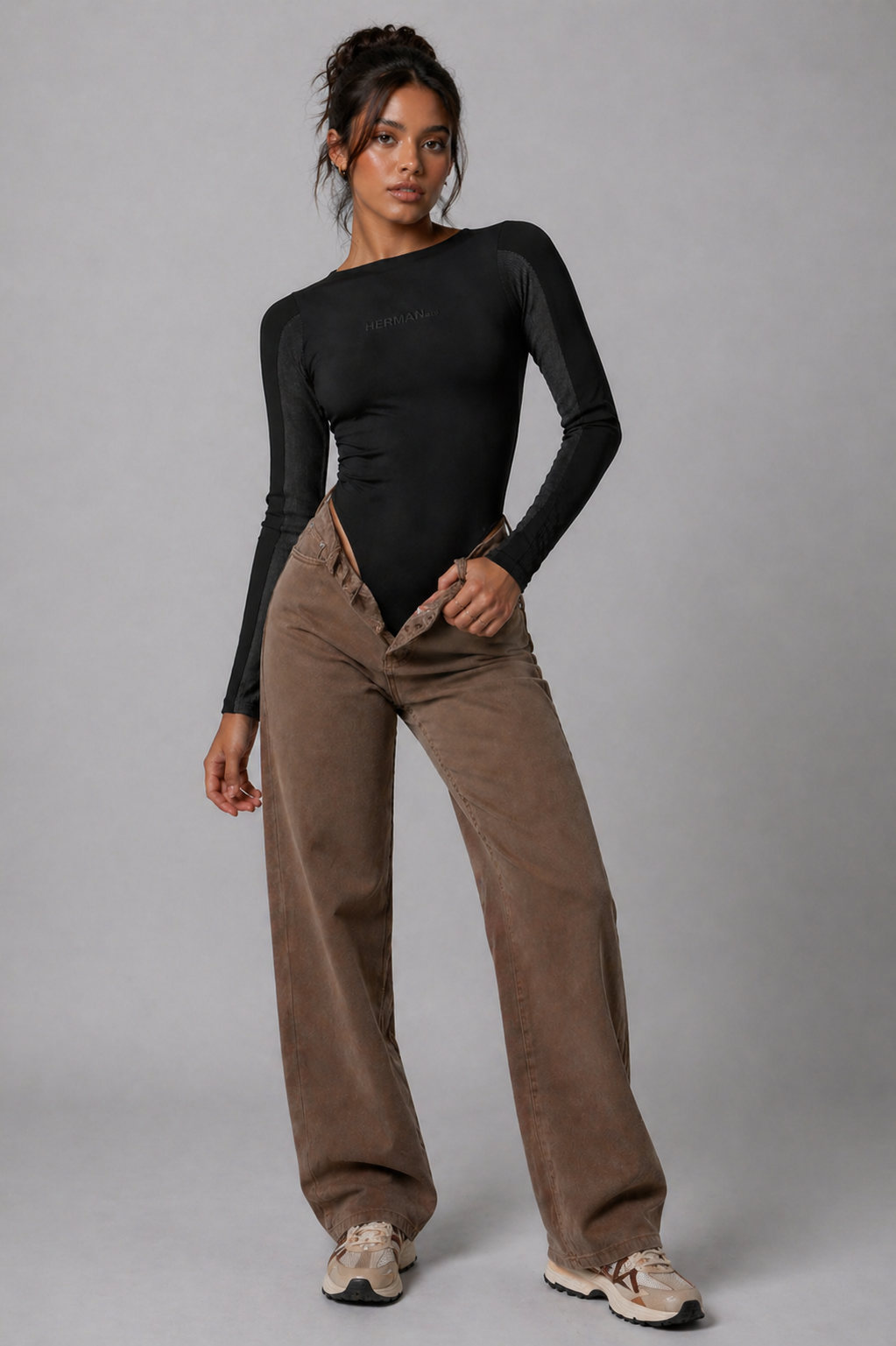 Jmojo black ribbed racer neck bodysuit highlighting shaping fit