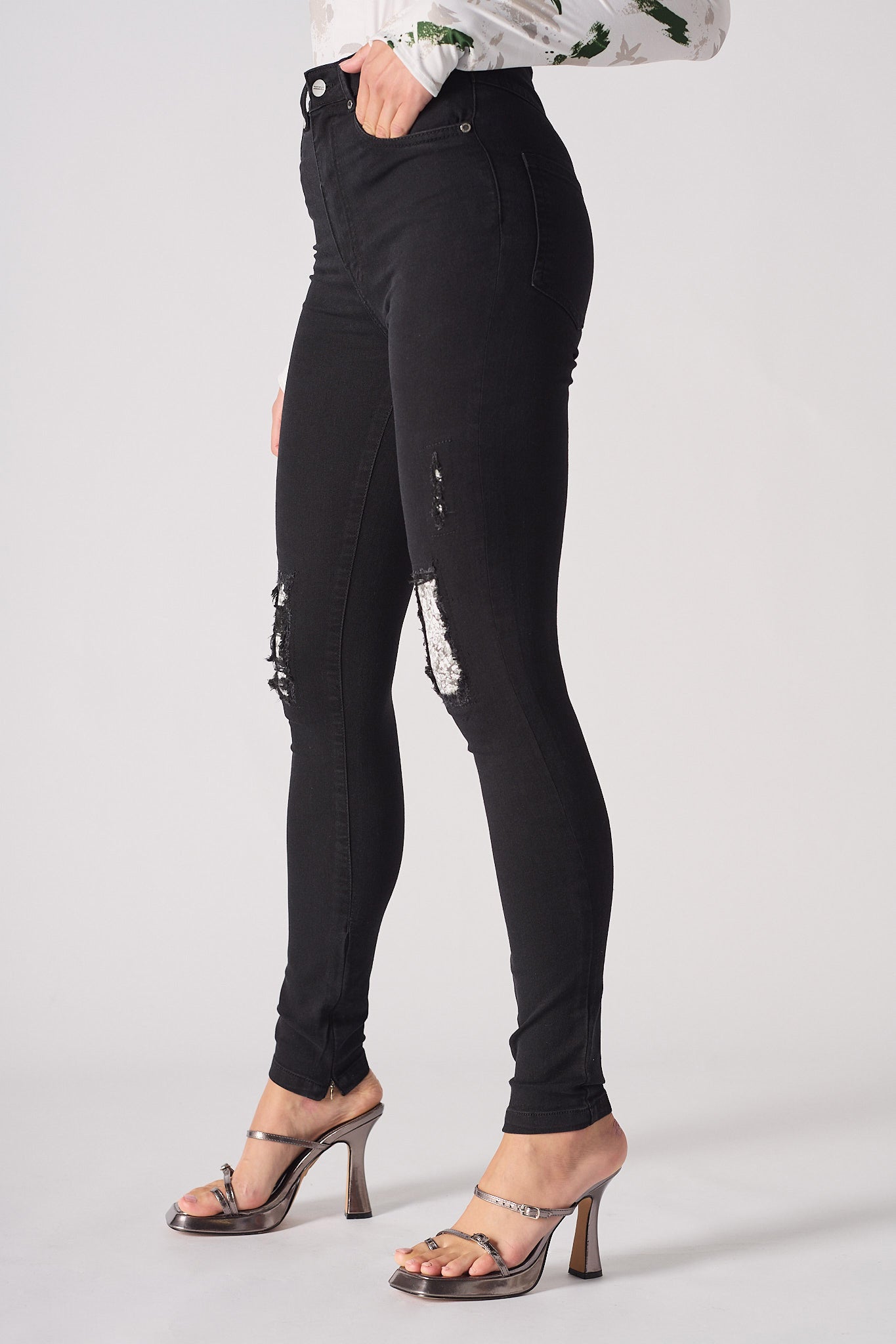 Jmojo black high waisted skinny jeans side close up knee detail