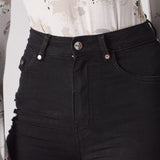 Jmojo black skinny jeans close up waist button and hardware detail