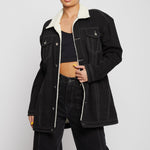 Jmojo black sherpa lined denim jacket worn open on model front view