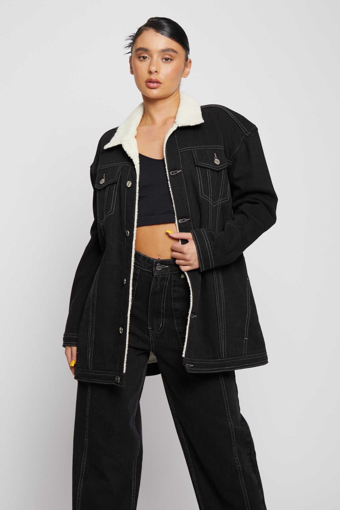 Jmojo black sherpa lined denim jacket worn open on model front view
