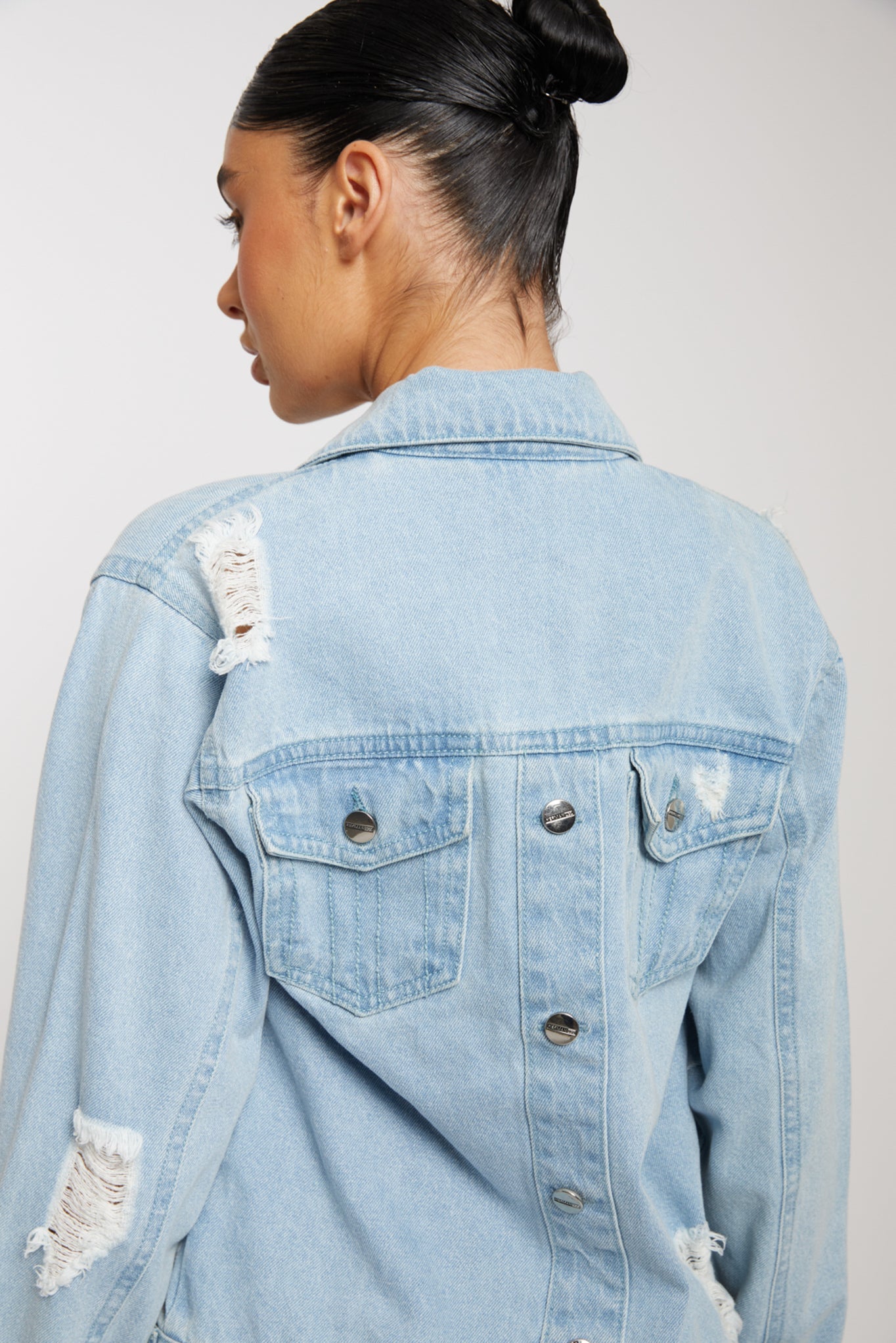 Jmojo distressed denim jacket women light wash back close up rip detail