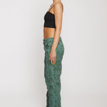 Jmojo green acid wash straight jeans side profile view on model