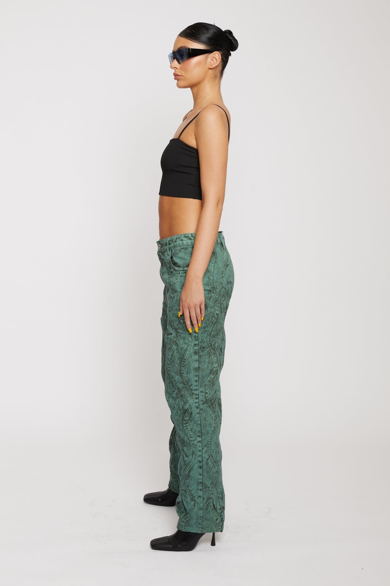 Jmojo green acid wash straight jeans side profile view on model