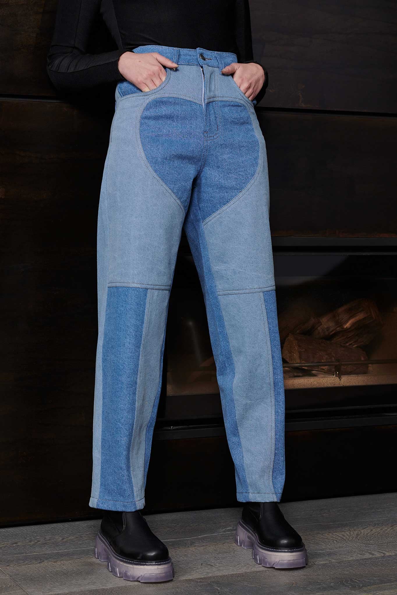 Side and front view of Jmojo two tone blue wash tapered jeans on model