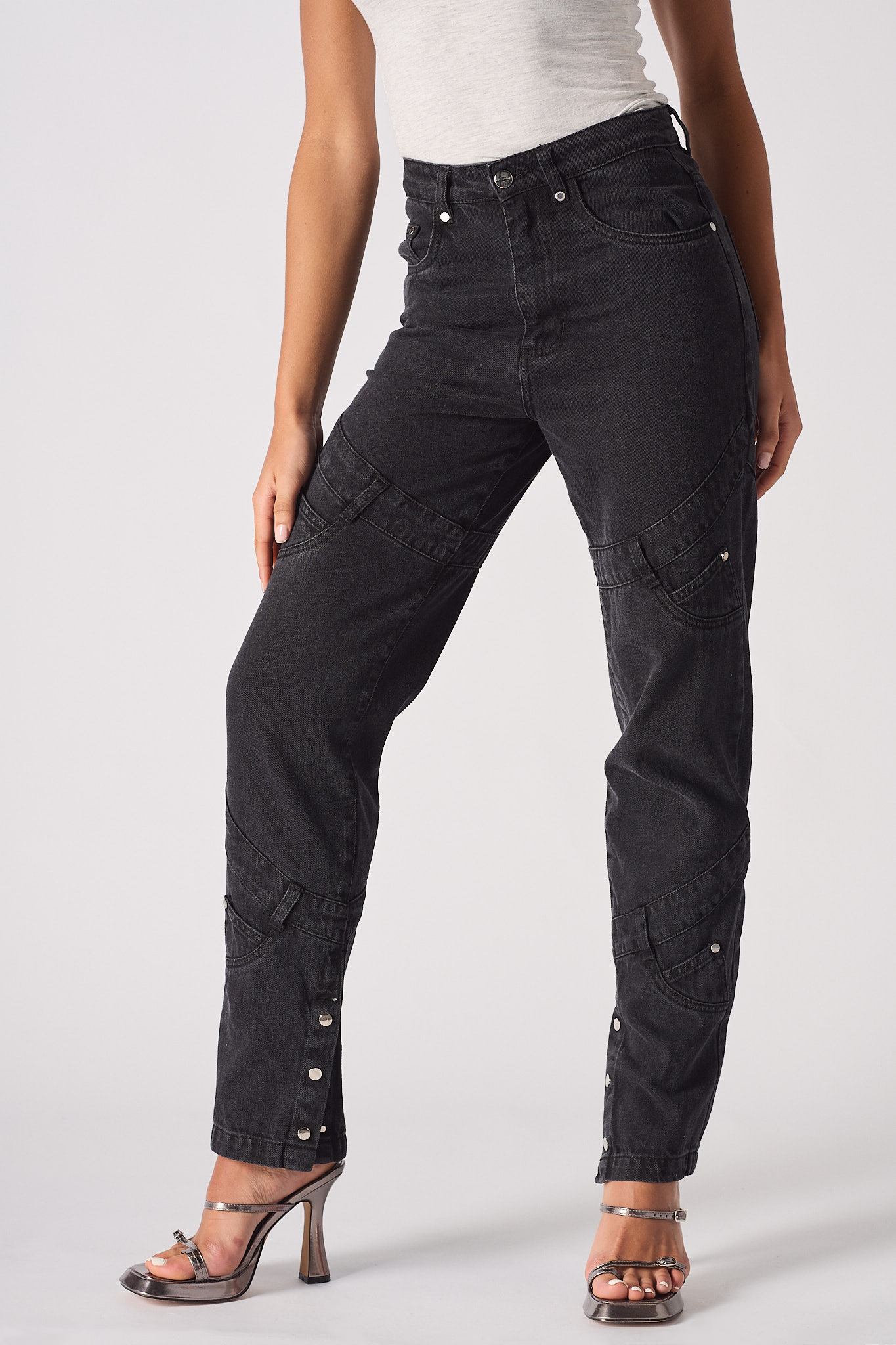 Jmojo high waisted black straight leg jeans side close up view with curved panel detailing