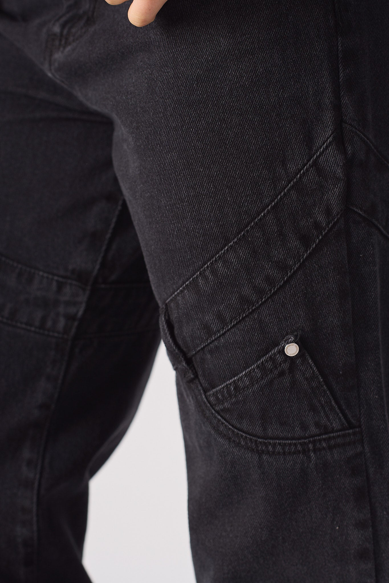 Jmojo high waisted black straight leg jeans thigh pocket and silver popper close up