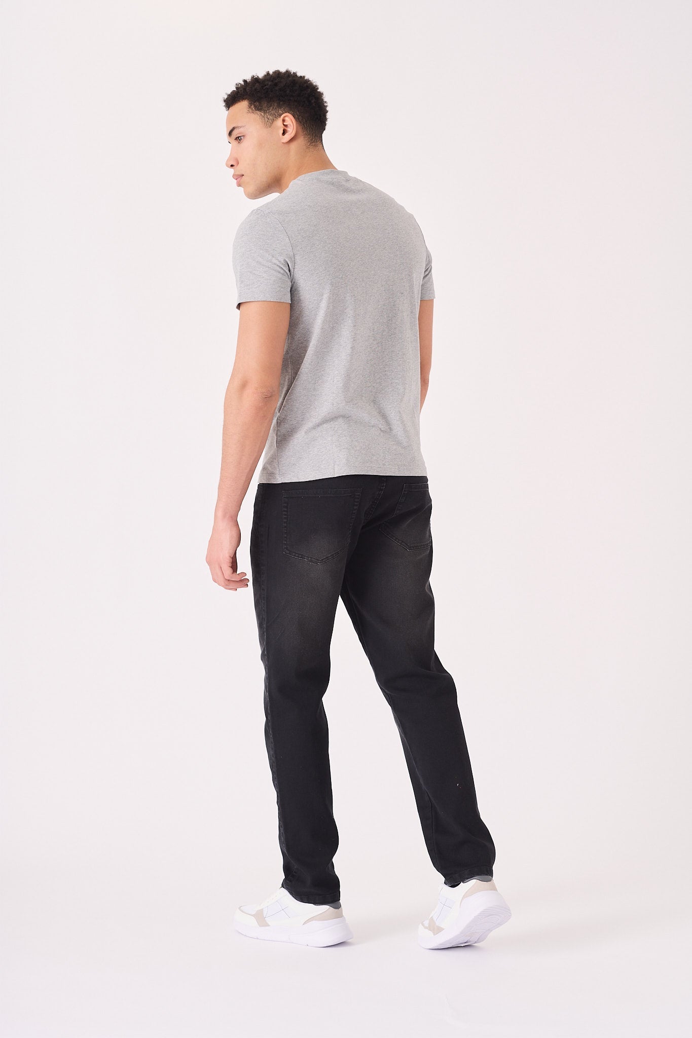 JMOJO straight leg black stretch jeans full length front view on model