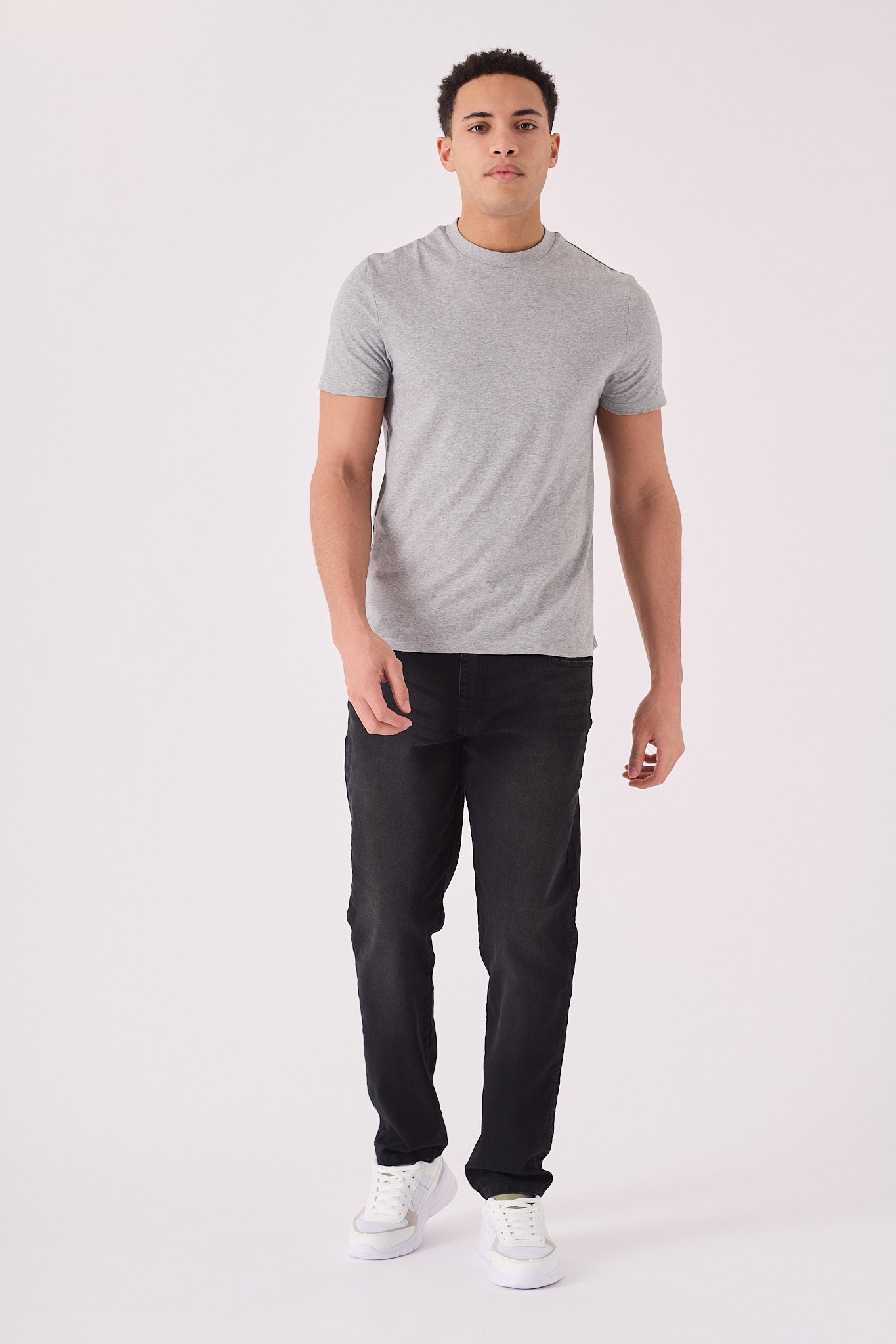 Men's washed black jeans full length side view, straight fit with mid-rise waist